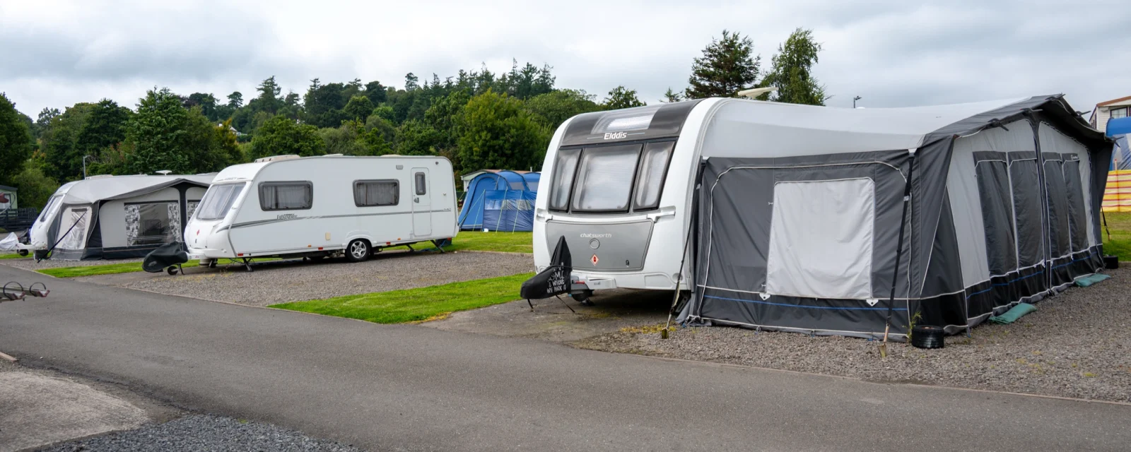 Caravans and tents on the touring pitches at Anwoth Holiday Park, Gatehouse of Fleet